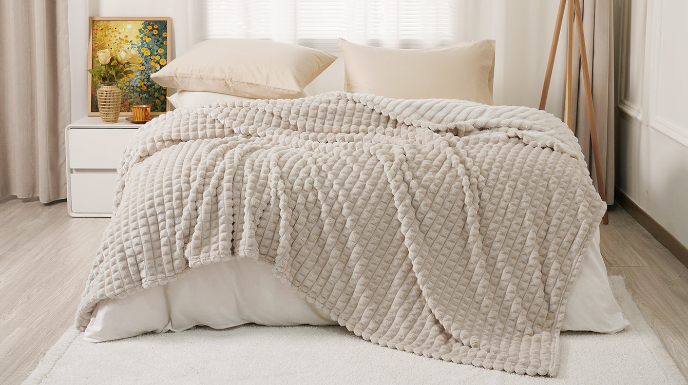PHF Luxury Soft Fleece Blanket in the bed
